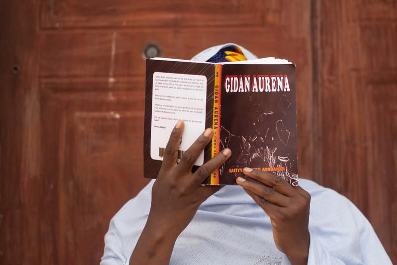 Open Arts Publishing participant with books